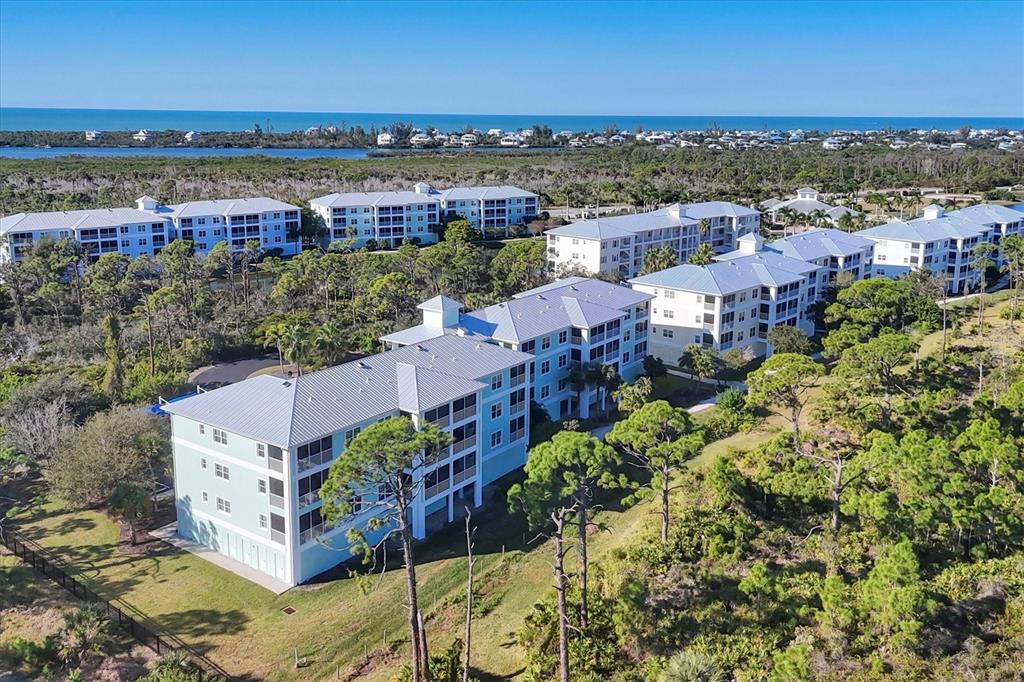 8407 Placida Road, Unit 307 Placida, FL 33946 - Photo 32 of 50 a view of a city with tall buildings