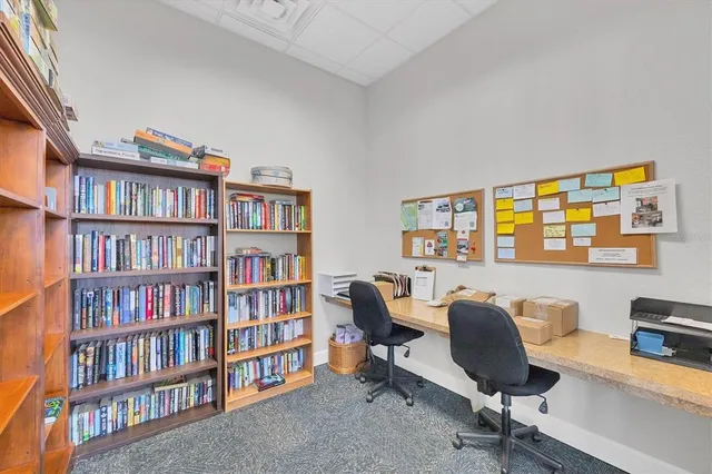 a view of a swimming pool with a yard