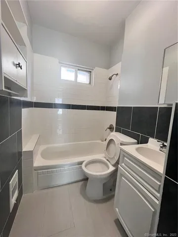 a bathroom with a sink and bathtub