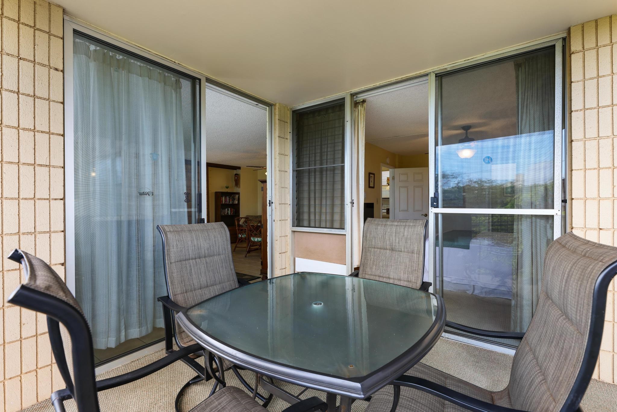 2619 South Kihei Road, Unit A305 Kihei, HI 96753 - Photo 11 of 44 a dining room with furniture and window