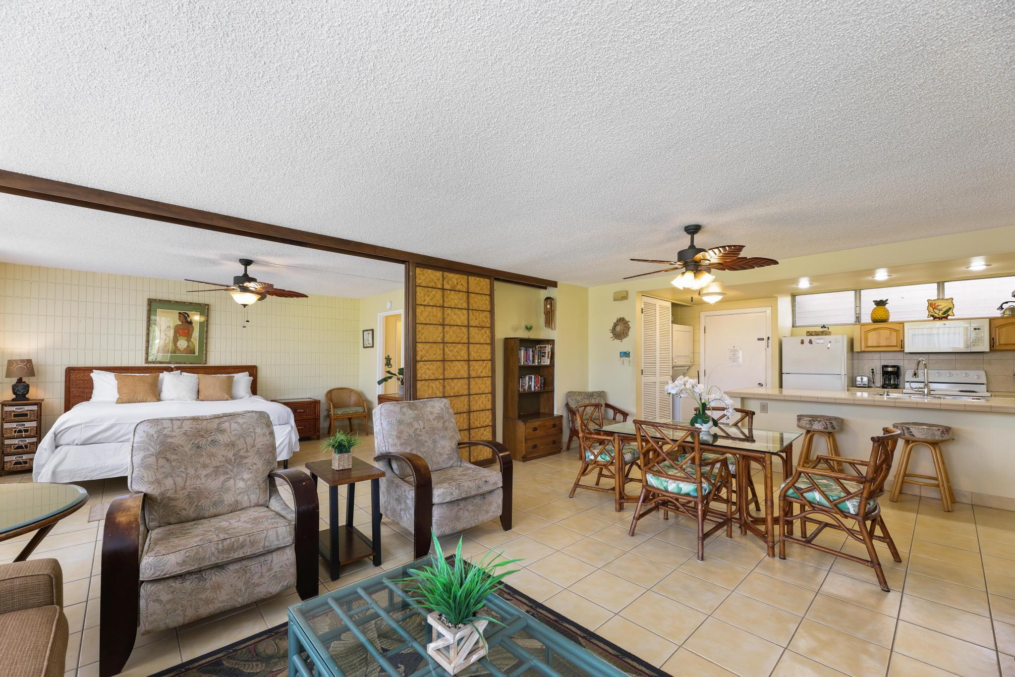 2619 South Kihei Road, Unit A305 Kihei, HI 96753 - Photo 6 of 44 a living room with furniture and wooden floor