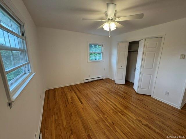 129 Salem Road Fishkill, NY 12524 - Photo 23 of 44 Bedroom #2 with ceiling light, ceiling fan and hard wood flooringg.