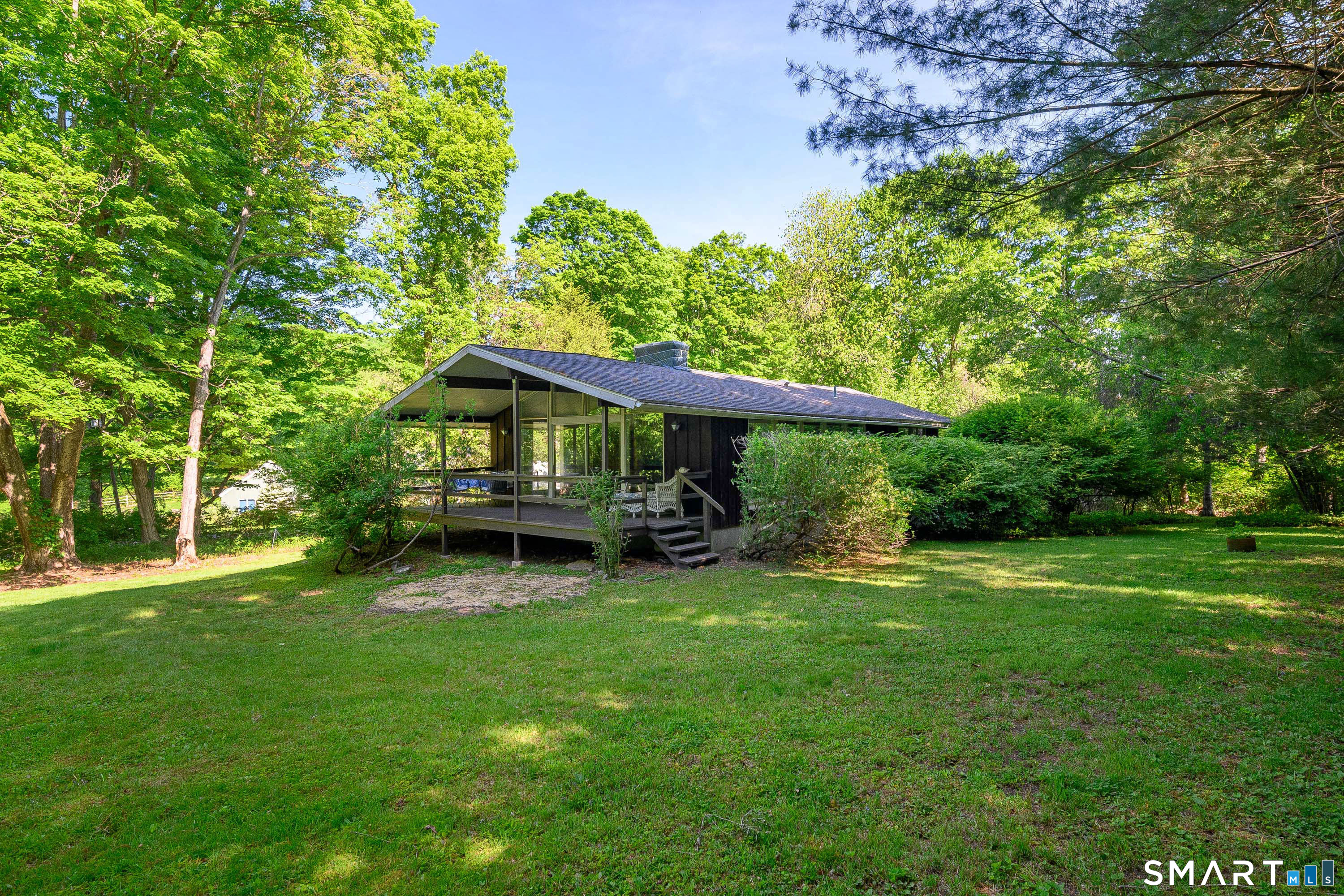 4 Pepper Pond Road Sherman, CT 06784 - Photo 24 of 33 a view of a house with a big yard