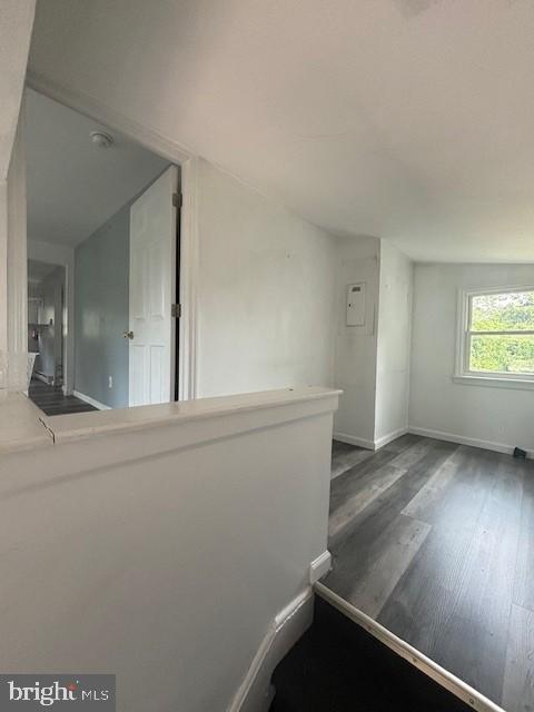 16 Oak Street, Unit R Salem, NJ 08079 - Photo 18 of 20 an empty room with wooden floor and windows