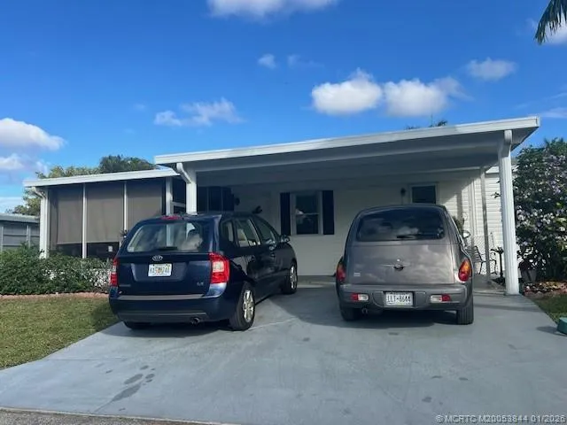 a car parked in front of a house