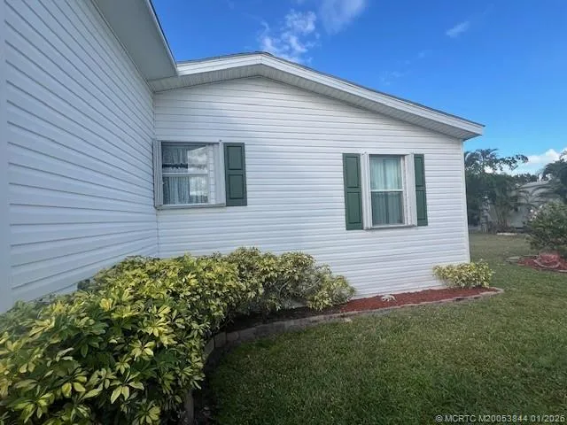 a view of a garden with a fountain