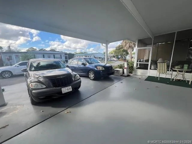 a view of a car in front of house