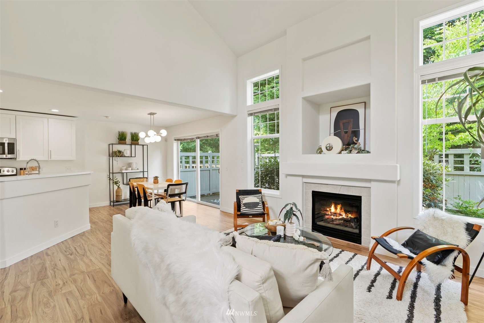507 Elma Place Northeast Renton, WA 98059 - Photo 11 of 36 a living room with furniture fireplace and window