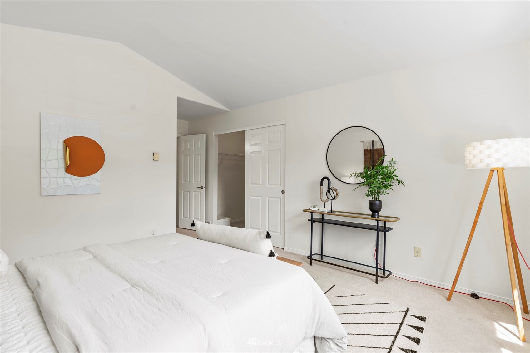 507 Elma Place Northeast Renton, WA 98059 - Photo 24 of 36 a bedroom with a bed and a table
