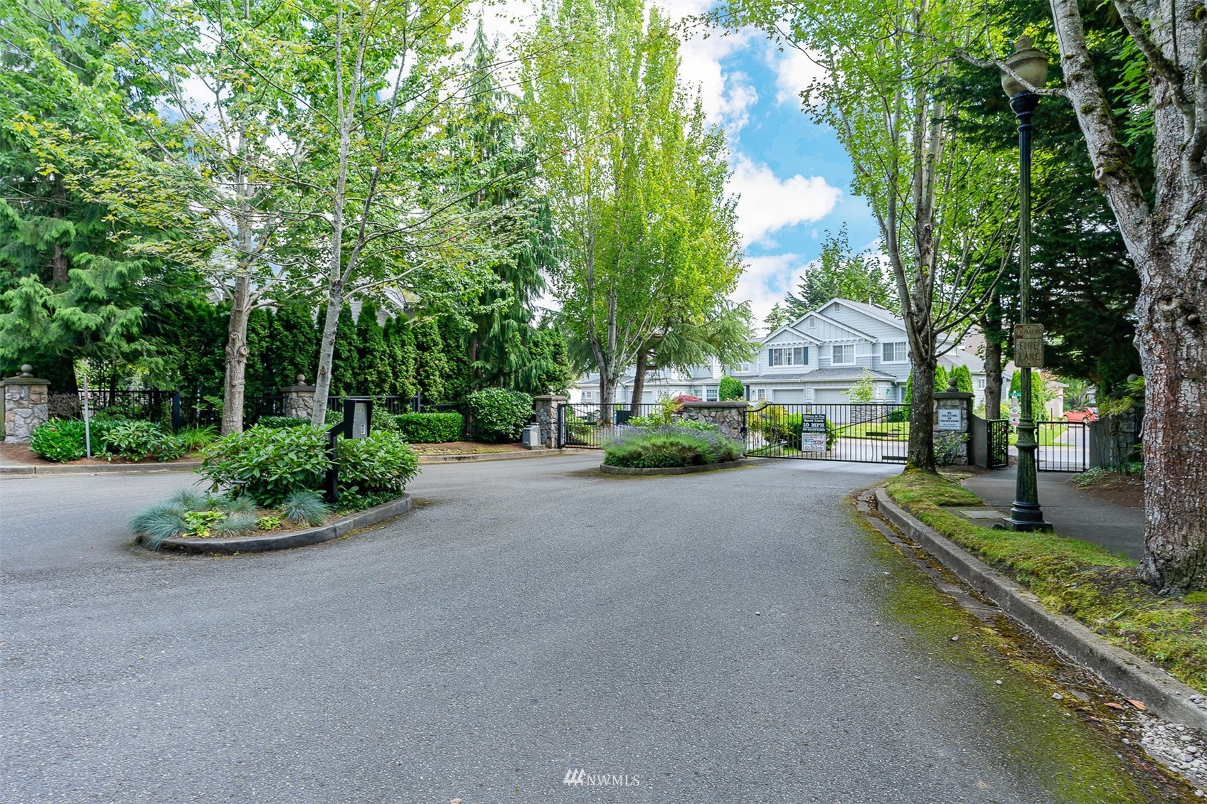 507 Elma Place Northeast Renton, WA 98059 - Photo 3 of 36 a view of a street with a houses