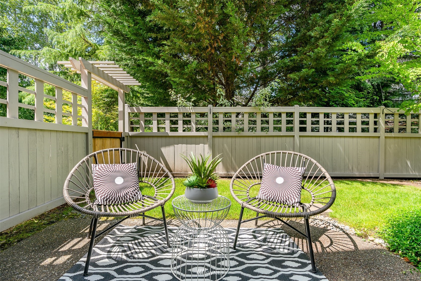 507 Elma Place Northeast Renton, WA 98059 - Photo 33 of 36 a balcony with chairs and wooden floor