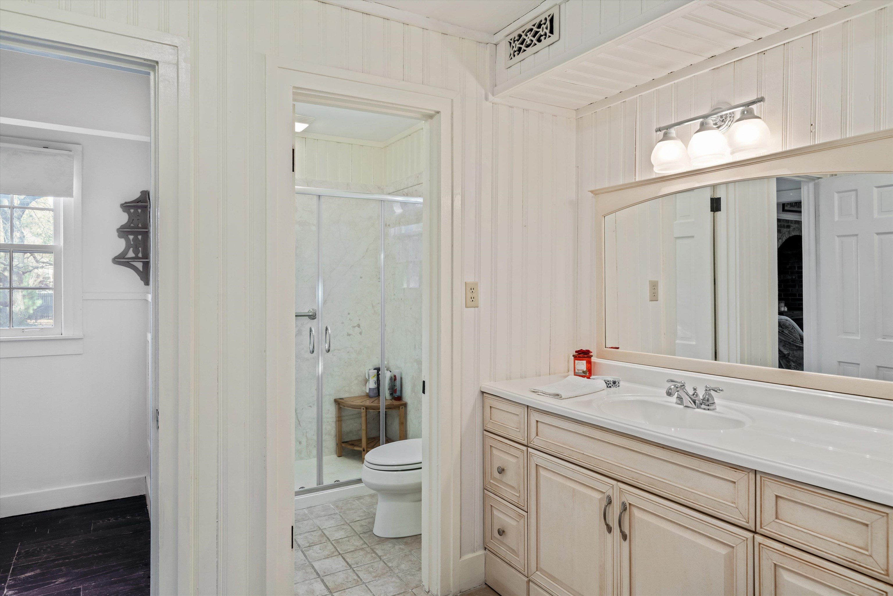 4375 Old Forest Road Memphis, TN 38125 - Photo 11 of 21 a bathroom with a sink a toilet and shower