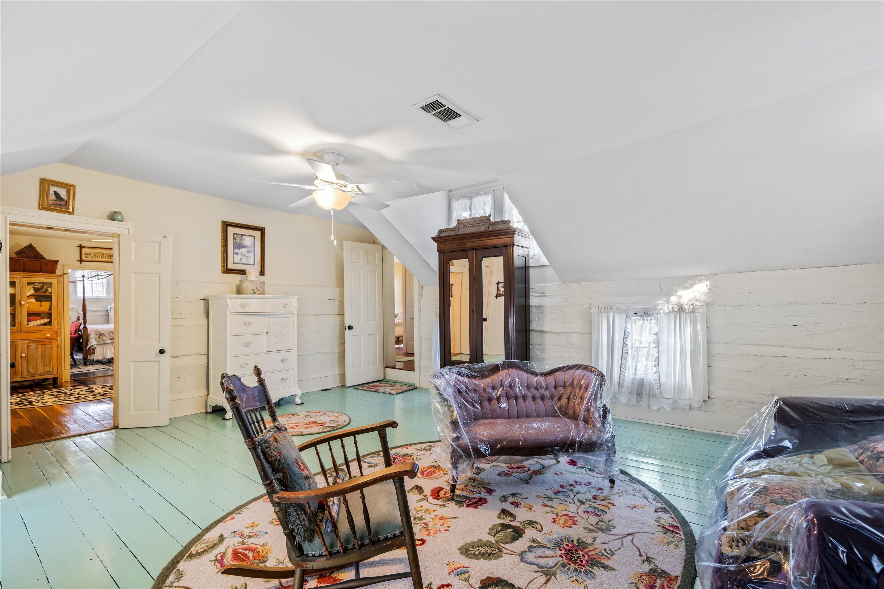 4375 Old Forest Road Memphis, TN 38125 - Photo 16 of 21 a living room with furniture and a chandelier