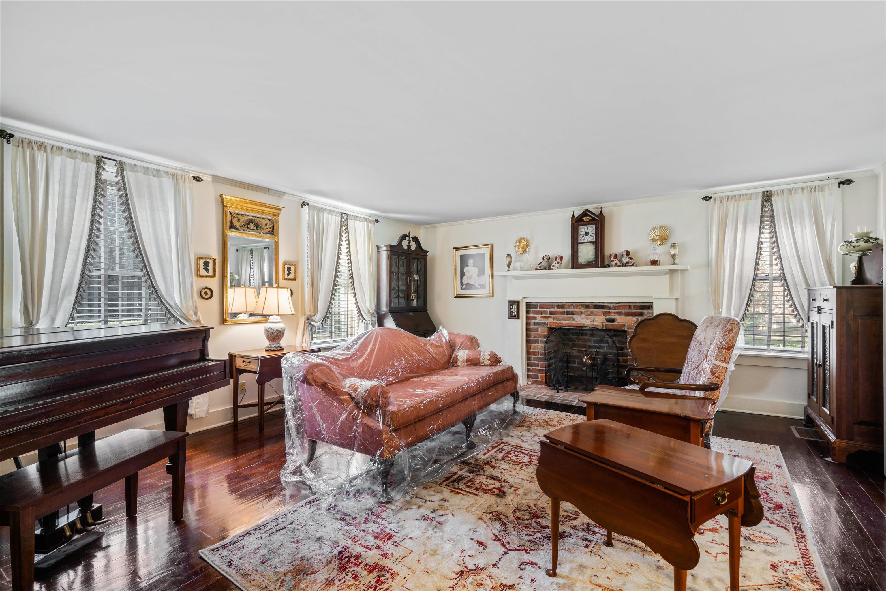 4375 Old Forest Road Memphis, TN 38125 - Photo 5 of 21 a living room with furniture and a fireplace