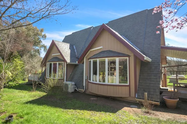 a view of a garden with a bench