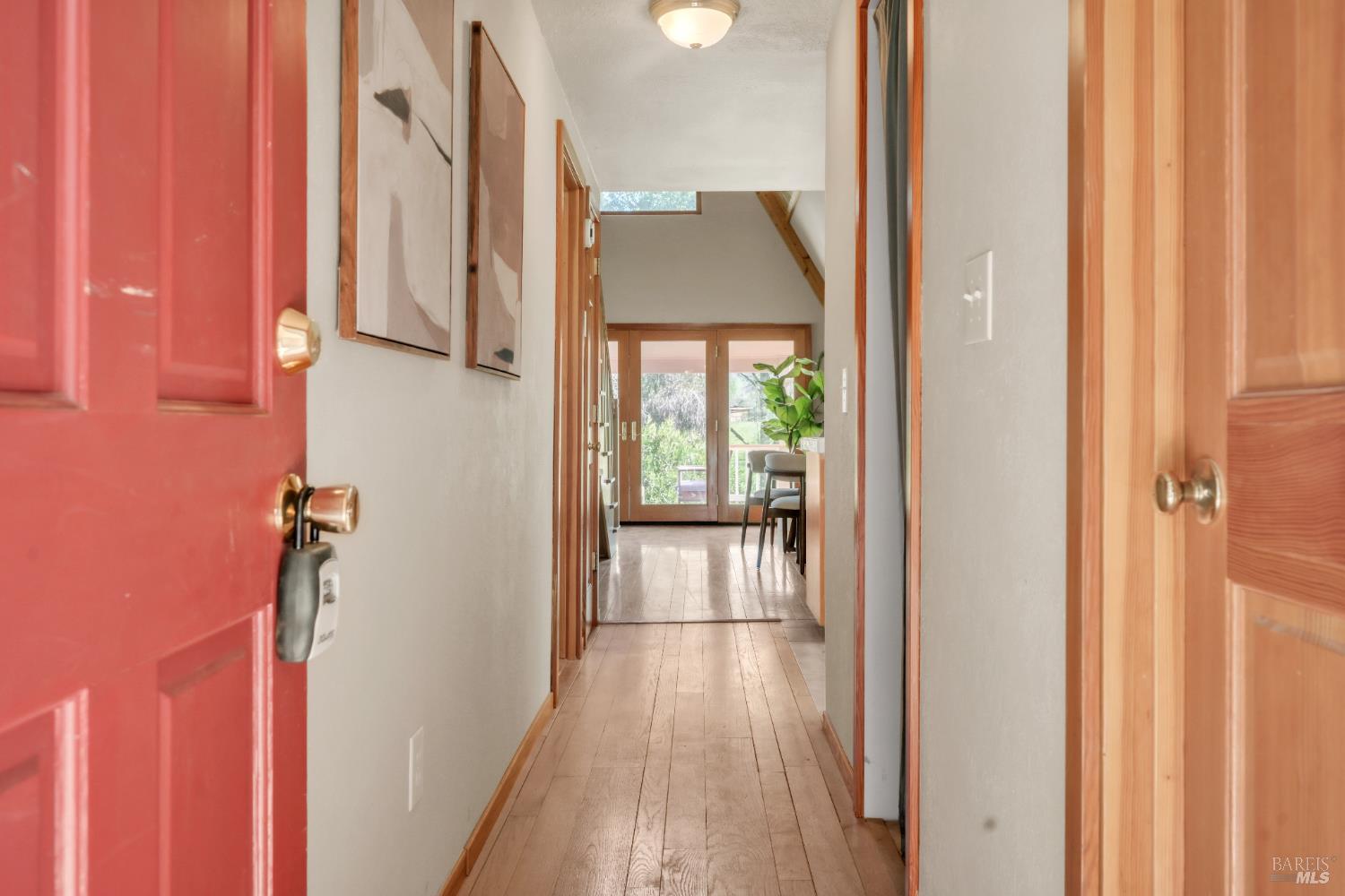 1996 River View Road Clearlake Oaks, CA 95423 - Photo 3 of 50 a view of a hallway with wooden floor and staircase
