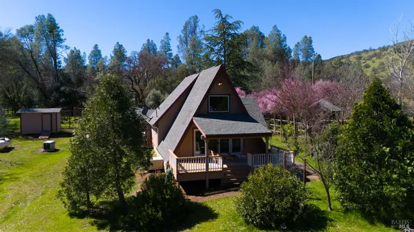 a view of a city with mountains in the background