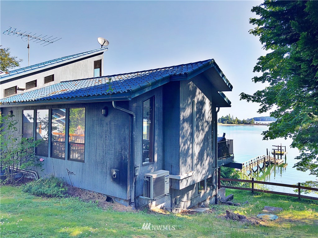 3123 West Sequim Bay Road Sequim, WA 98382 - Photo 2 of 6 a view of backyard with deck and garden