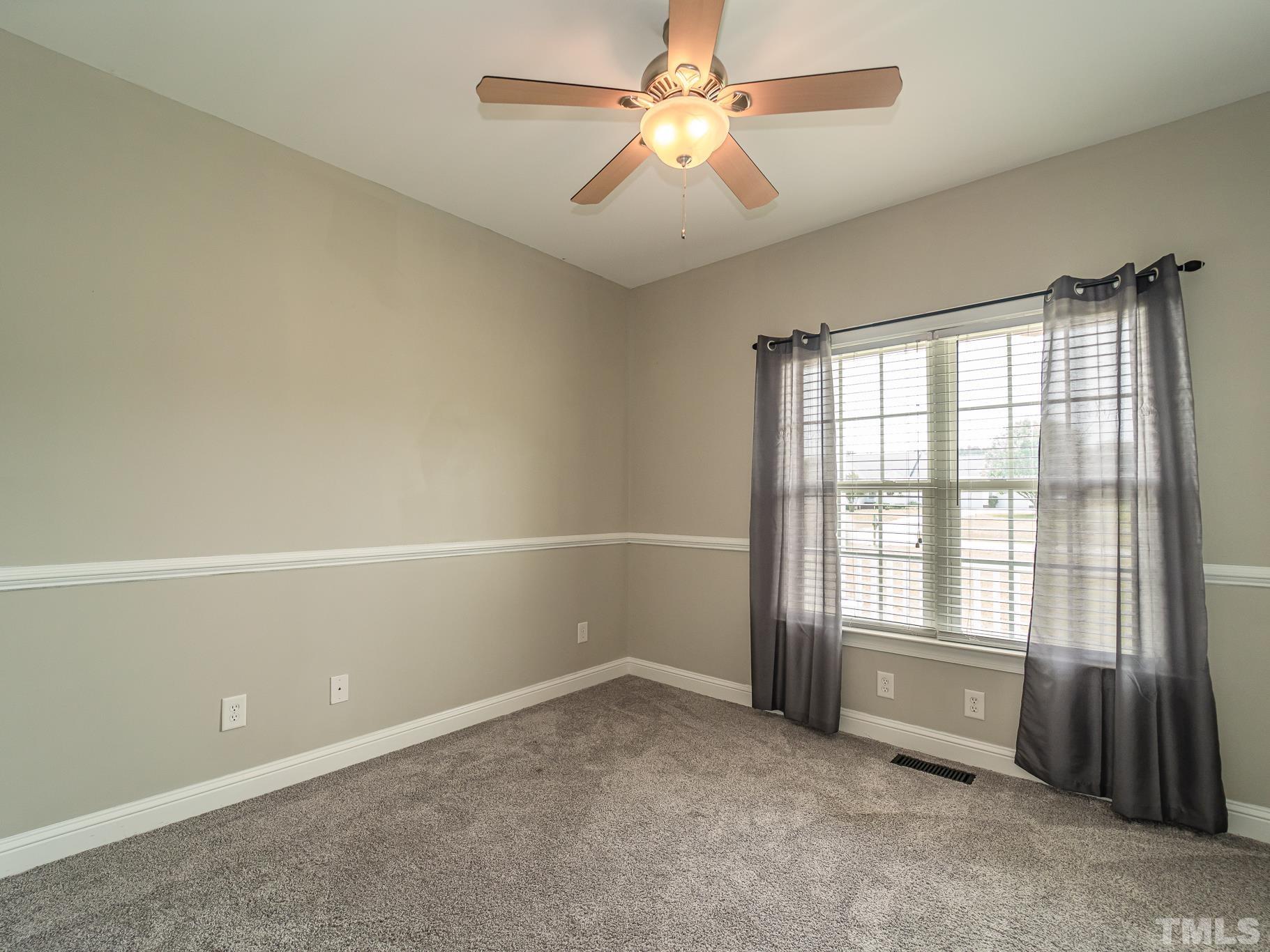 7730 La Finca Road Elm City, NC 27822 - Photo 21 of 29 an empty room with a window