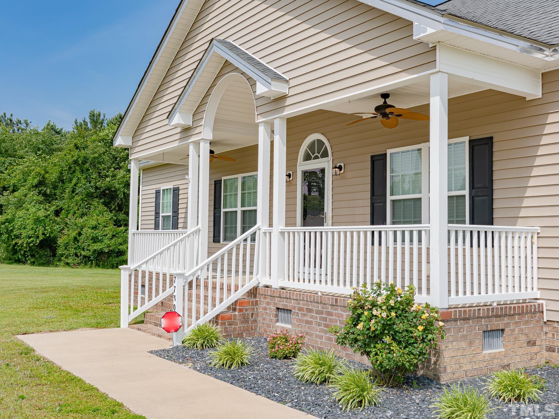 7730 La Finca Road Elm City, NC 27822 - Photo 3 of 29 a front view of a house having yard