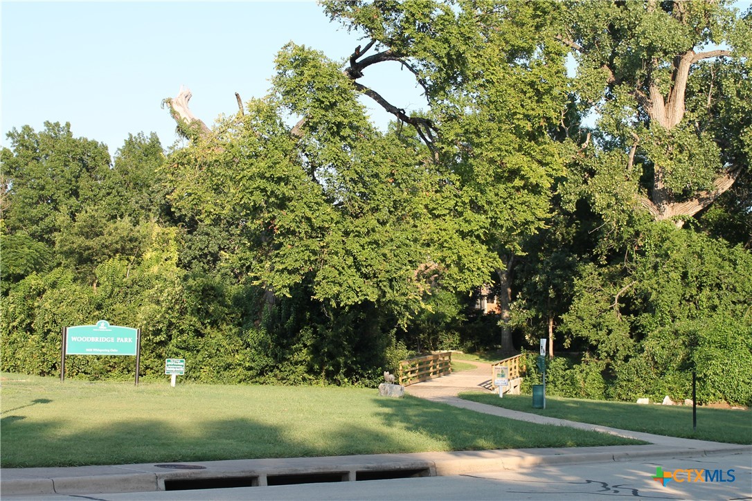 3702 Fall Creek Lane Temple, TX 76504 - Photo 12 of 13 a backyard of a house with lots of green space