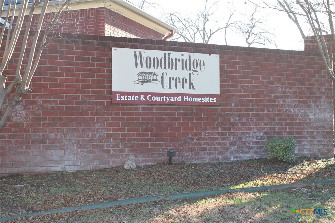 3702 Fall Creek Lane Temple, TX 76504 - Photo 8 of 13 a sign that is on the side of a building