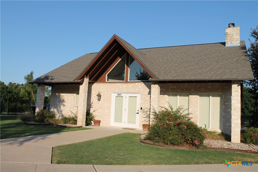 3702 Fall Creek Lane Temple, TX 76504 - Photo 9 of 13 a front view of a house with a yard