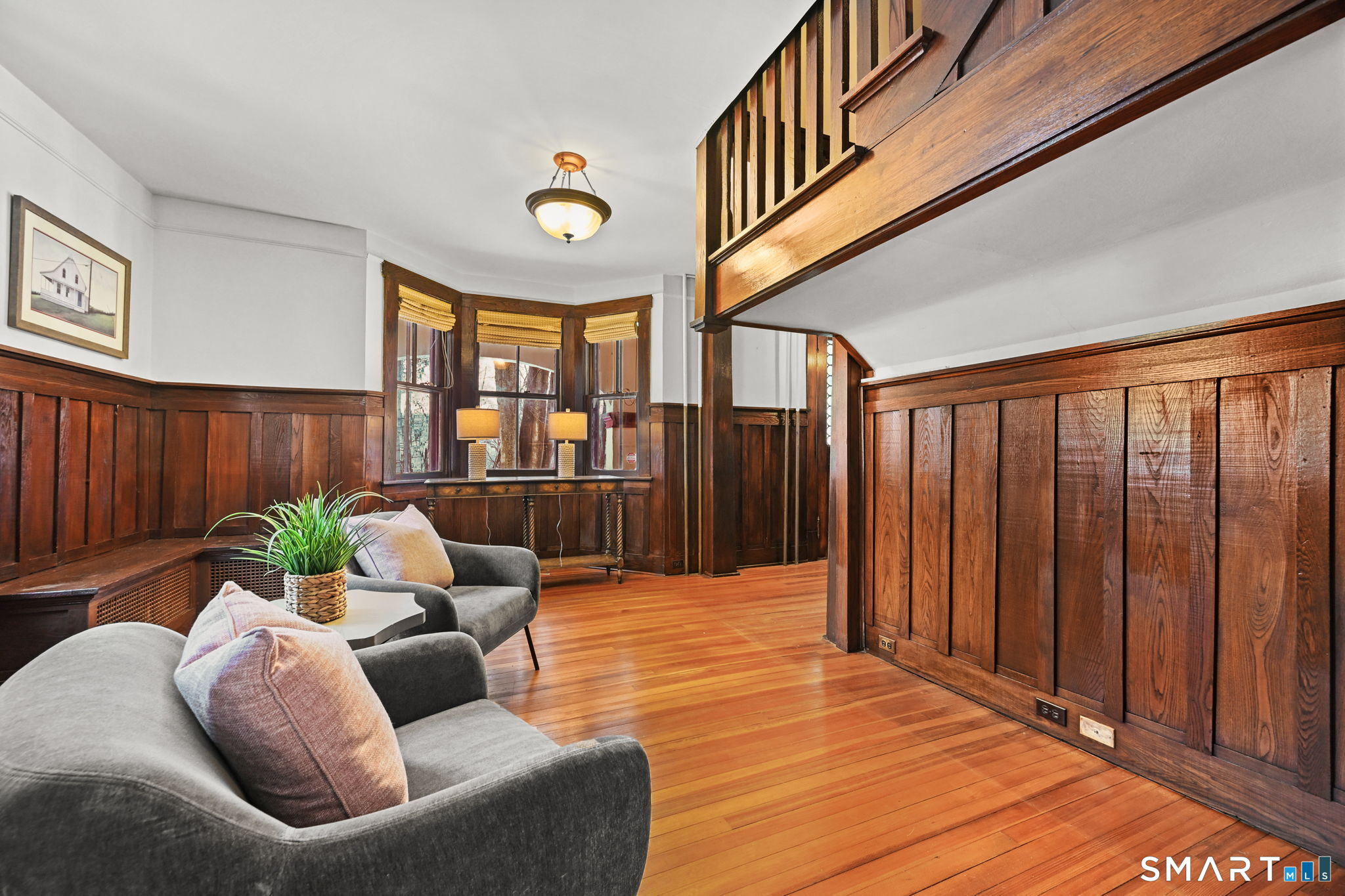 32 Catalpa Road Wilton, CT 06897 - Photo 11 of 36 a view of a patio with couches chairs and wooden floor