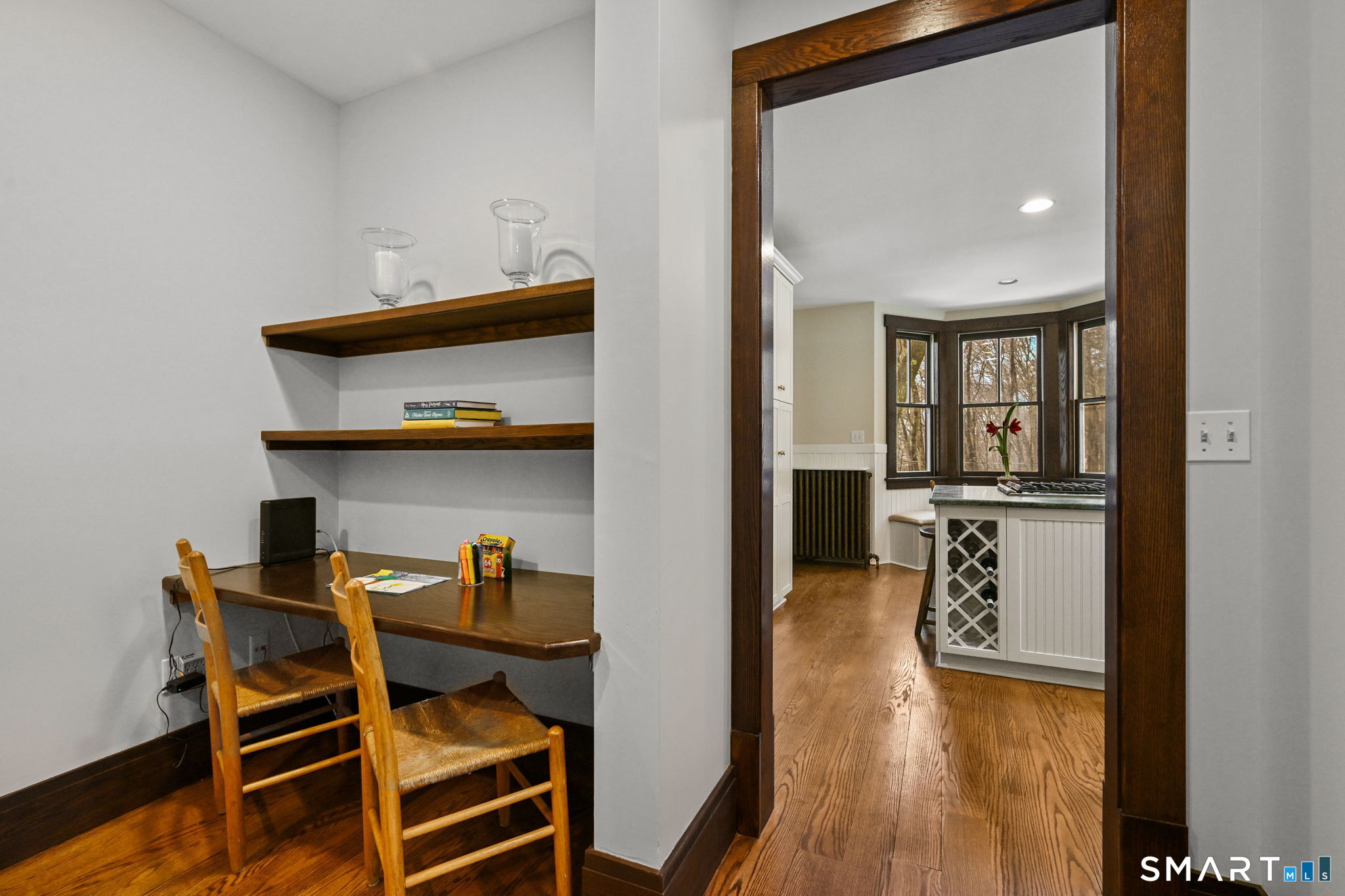 32 Catalpa Road Wilton, CT 06897 - Photo 15 of 36 a view of kitchen island with furniture and wooden floor