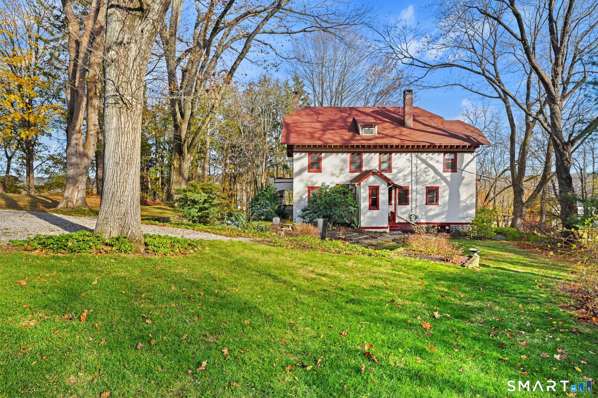 32 Catalpa Road Wilton, CT 06897 - Photo 2 of 36 a view of a house with backyard and sitting area
