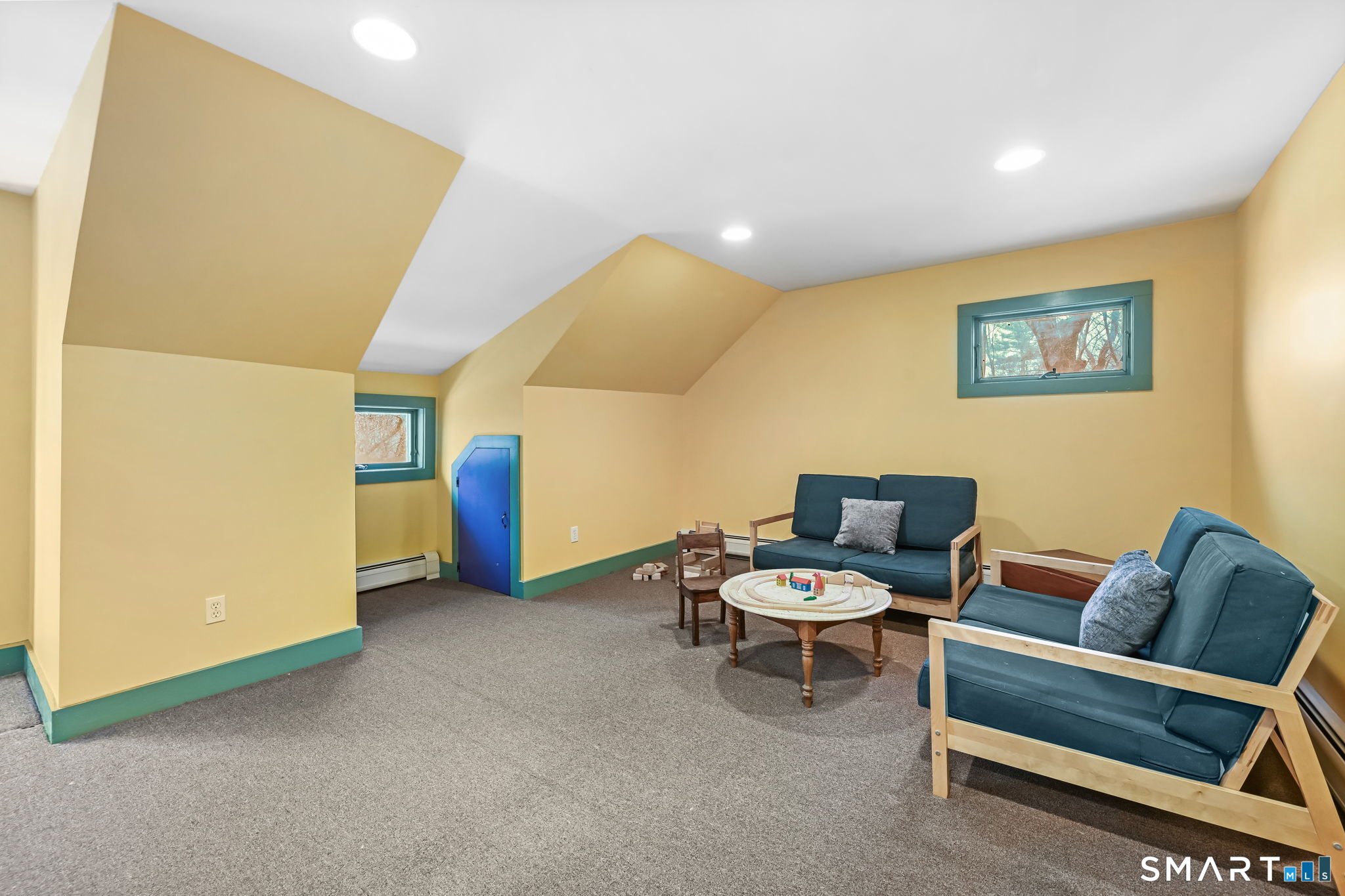 32 Catalpa Road Wilton, CT 06897 - Photo 25 of 36 a living room with furniture and a window