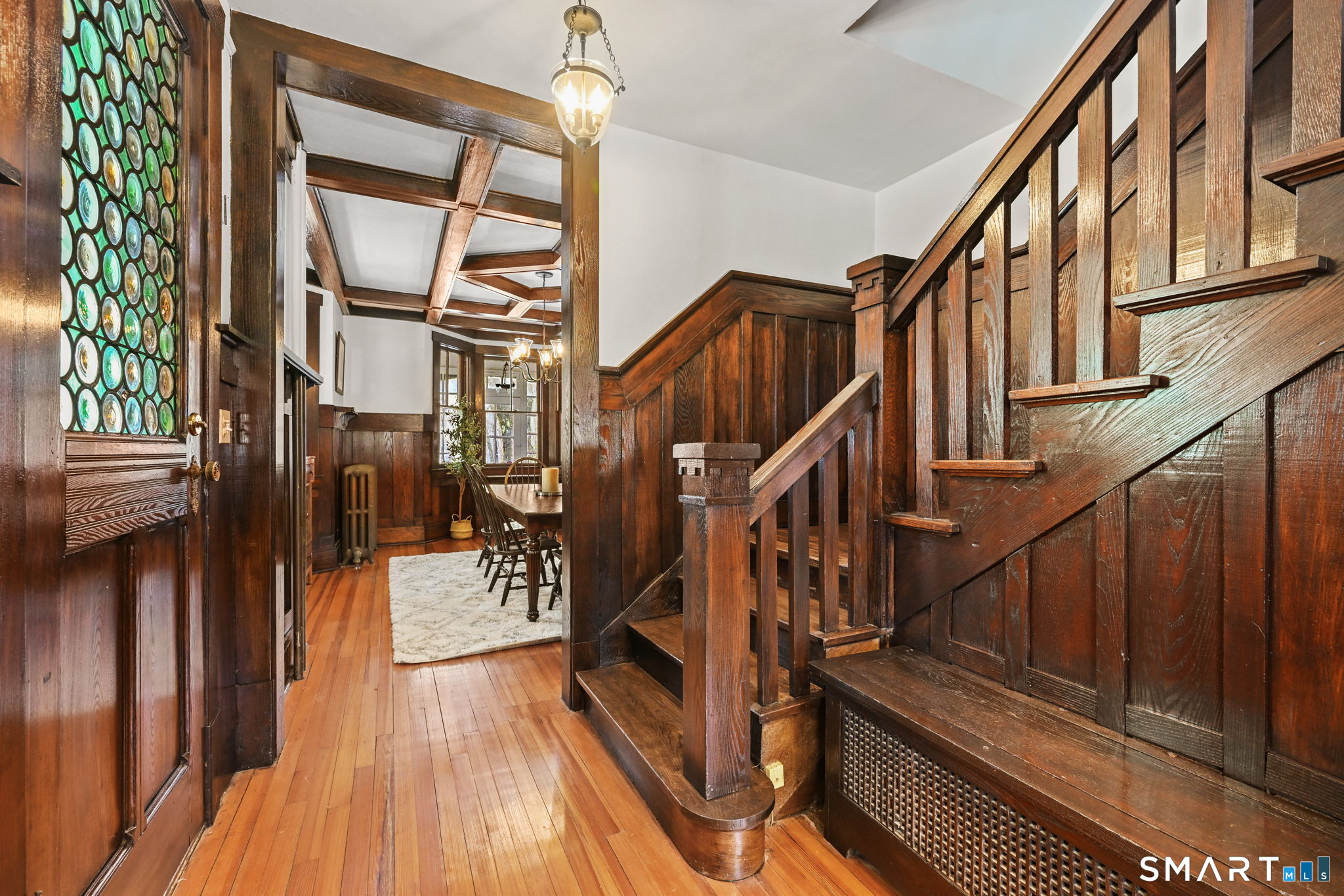 32 Catalpa Road Wilton, CT 06897 - Photo 9 of 36 a view of staircase with wooden floor and staircase