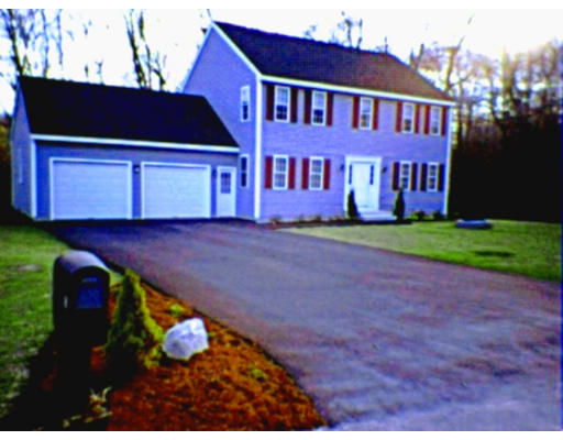 3 Flaxfield Road Dudley, MA 01571 - Photo 1 of 6 a view of a house with a yard