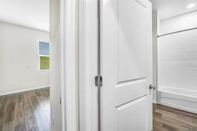 a view of a swimming pool with an outdoor space and seating area