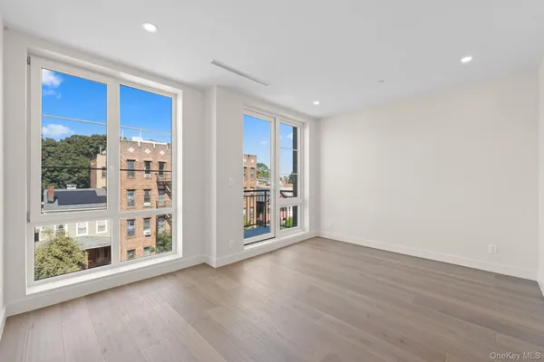 a view of empty room with windows