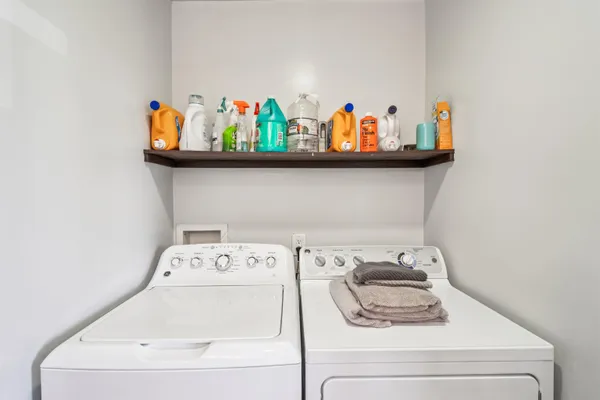 a utility room with lots of cabinet