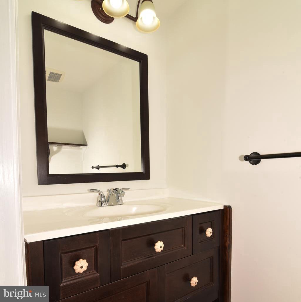 453 Foxridge Drive Southwest Leesburg, VA 20175 - Photo 17 of 35 Powder Room off of the Main Level Hallway