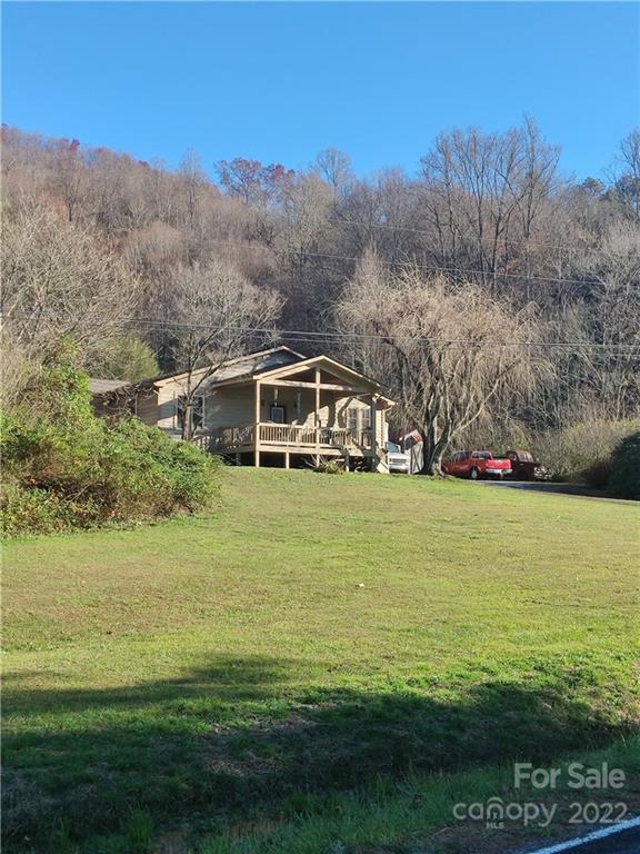 903 Middlefork Road Brevard, NC 28712 - Photo 1 of 11 a balcony with an outdoor space