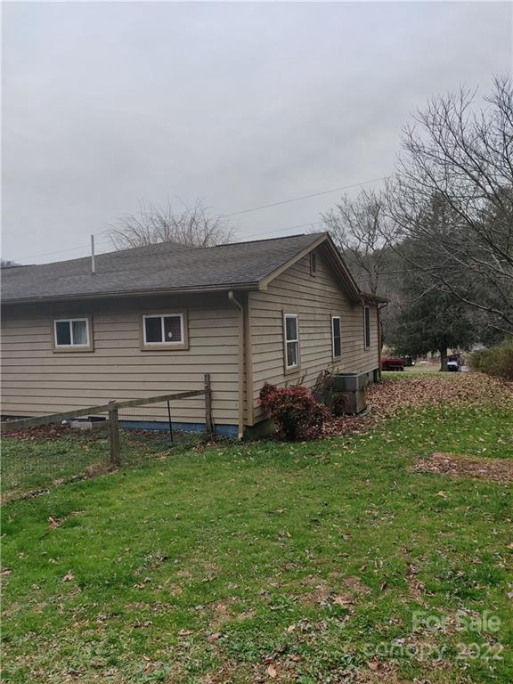 903 Middlefork Road Brevard, NC 28712 - Photo 11 of 11 a backyard of a house with lots of green space