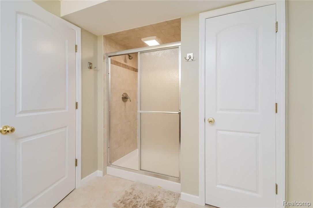 2178 Reagan Drive Rochester, MI 48309 - Photo 36 of 44 Basement Bath has large shower