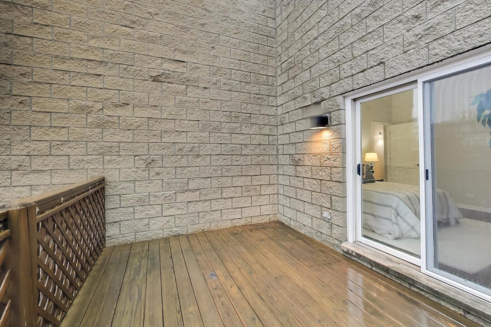 1312 West Fletcher Street, Unit 3W Chicago, IL 60657 - Photo 14 of 30 a bathroom with a wooden floor