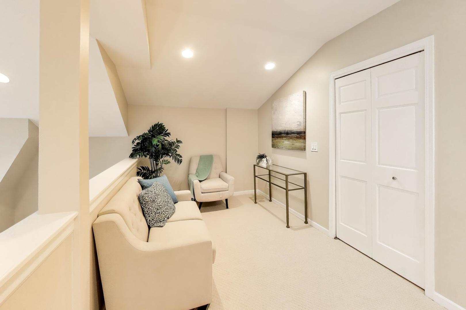 1312 West Fletcher Street, Unit 3W Chicago, IL 60657 - Photo 19 of 30 a living room with furniture and a potted plant