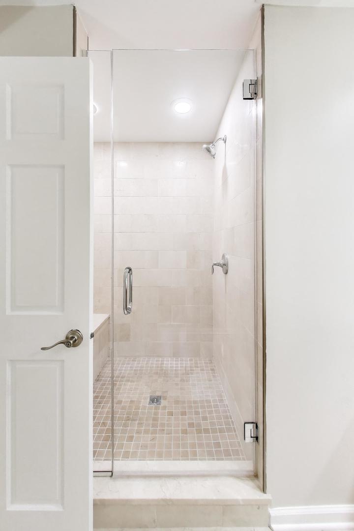 1312 West Fletcher Street, Unit 3W Chicago, IL 60657 - Photo 26 of 30 a bathroom with a shower