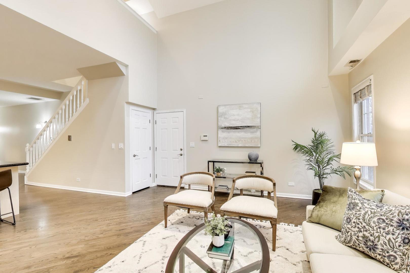 1312 West Fletcher Street, Unit 3W Chicago, IL 60657 - Photo 4 of 30 a living room with furniture and wooden floor