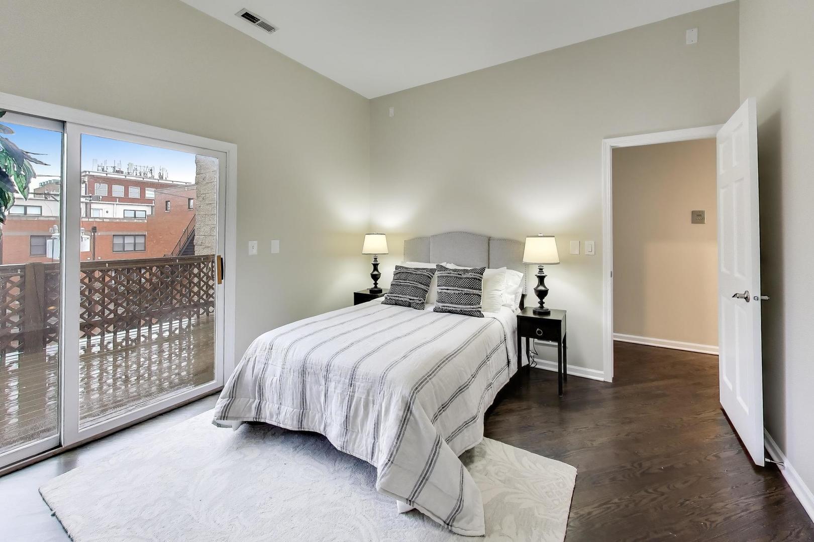 1312 West Fletcher Street, Unit 3W Chicago, IL 60657 - Photo 8 of 30 a bedroom with a bed and a window