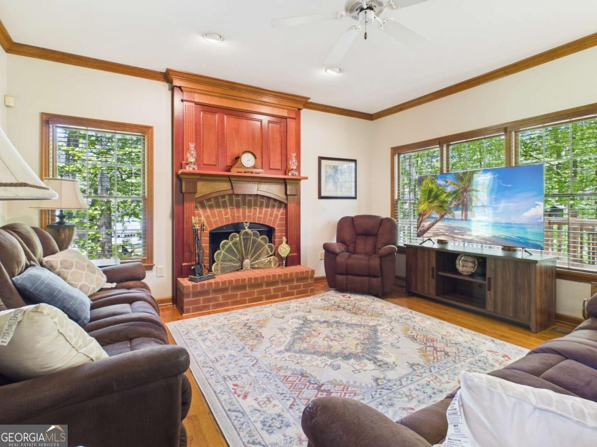 1120 Laurel Pointe Watkinsville, GA 30677 - Photo 13 of 50 a living room with furniture and a large window