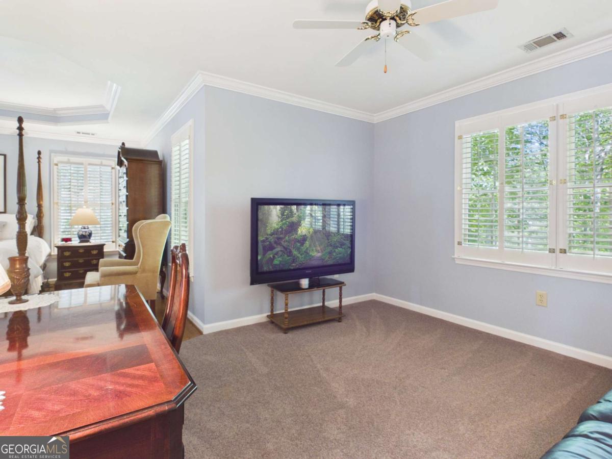1120 Laurel Pointe Watkinsville, GA 30677 - Photo 21 of 50 a view of a livingroom with furniture and a window
