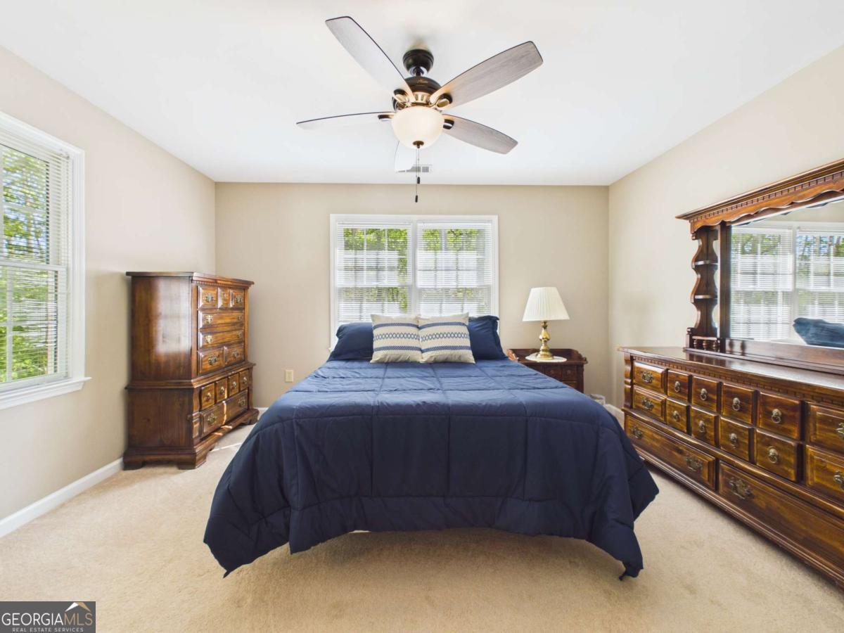 1120 Laurel Pointe Watkinsville, GA 30677 - Photo 32 of 50 a bedroom with a bed and window