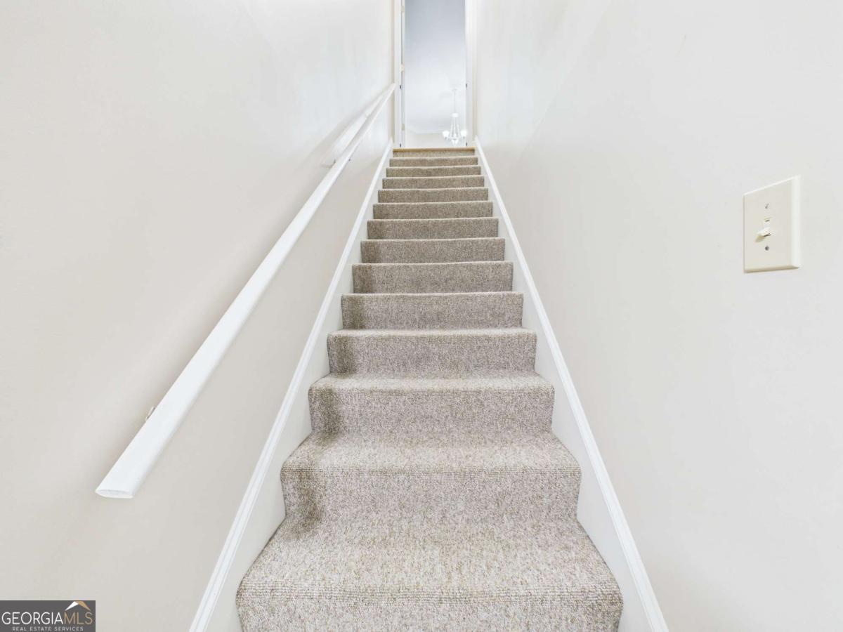 1120 Laurel Pointe Watkinsville, GA 30677 - Photo 33 of 50 a view of staircase with white walls