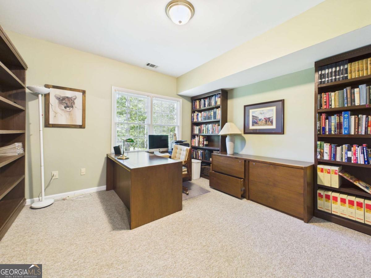 1120 Laurel Pointe Watkinsville, GA 30677 - Photo 34 of 50 a living room with furniture and a window